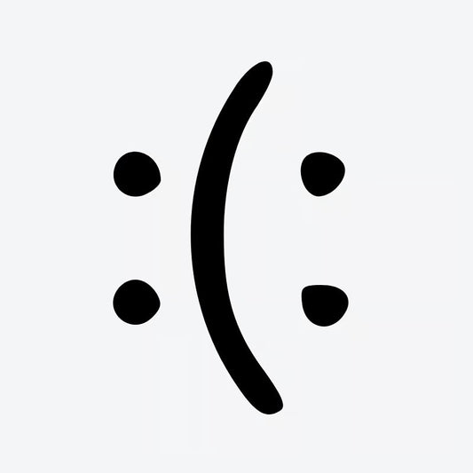 Sad Face Emoji Tattoo