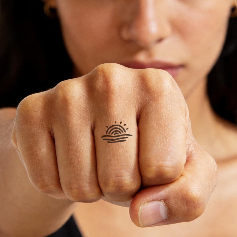 Sunrise Over Waves Tattoo