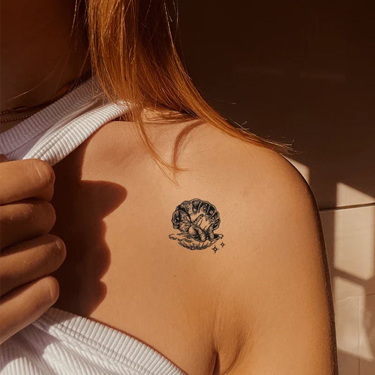 Butterfly Pearl Tattoo