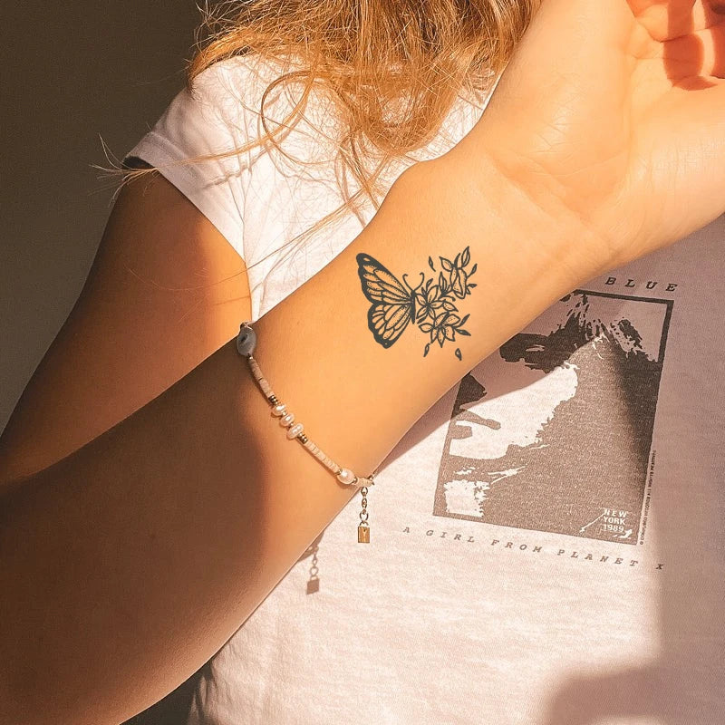Fallen Petals Butterfly Tattoo