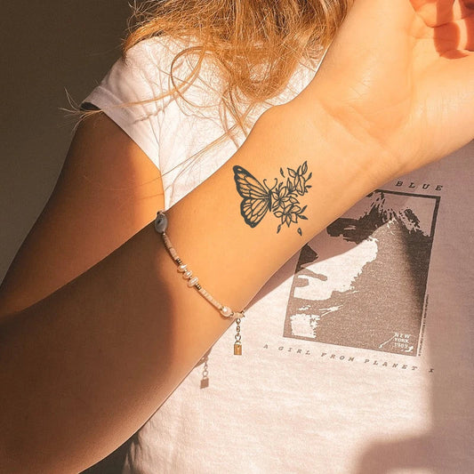 Fallen Petals Butterfly Tattoo