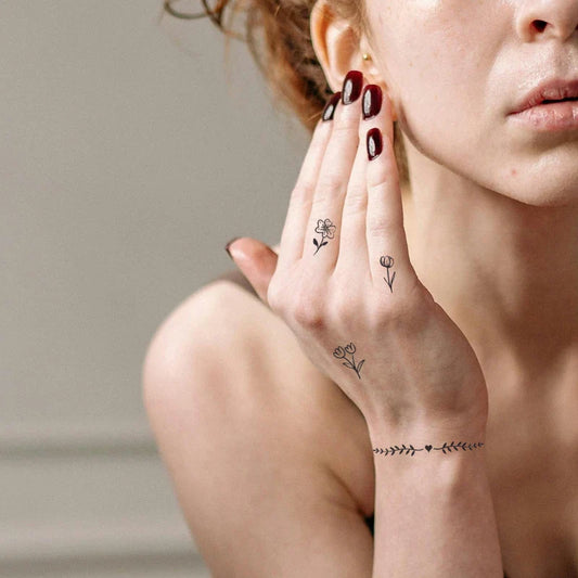 Flower Finger Tattoo