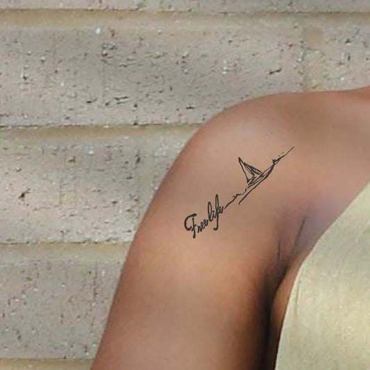 Free Life Tattoo