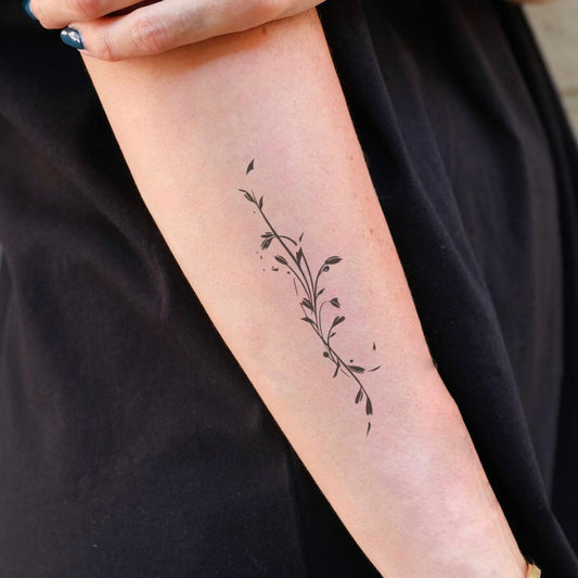 Elegant Floral Vine Tattoo
