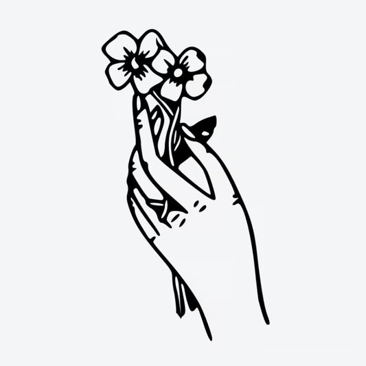 Hand Holding Flowers Tattoo