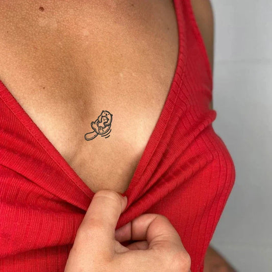 Otter Baby Tattoo