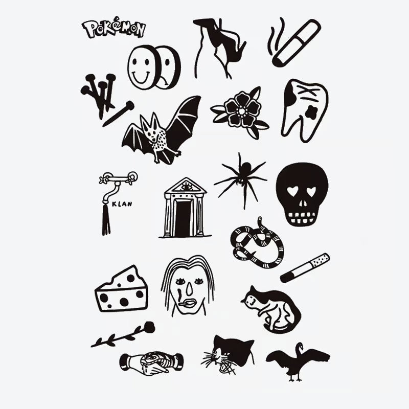 Eclectic Symbol Finger Tattoo