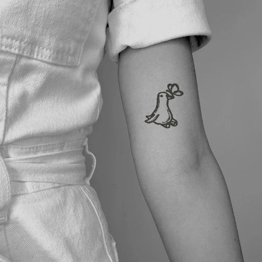 The Goose Dancing With Butterflies Tattoo
