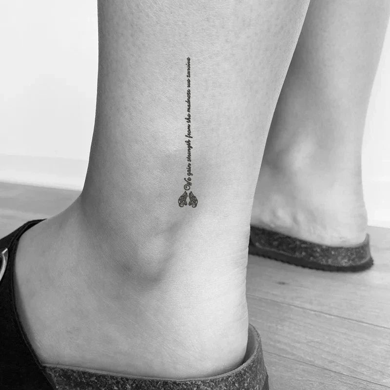 We Gain Strength From The Madness We Survive Tattoo