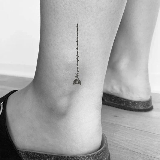 We Gain Strength From The Madness We Survive Tattoo