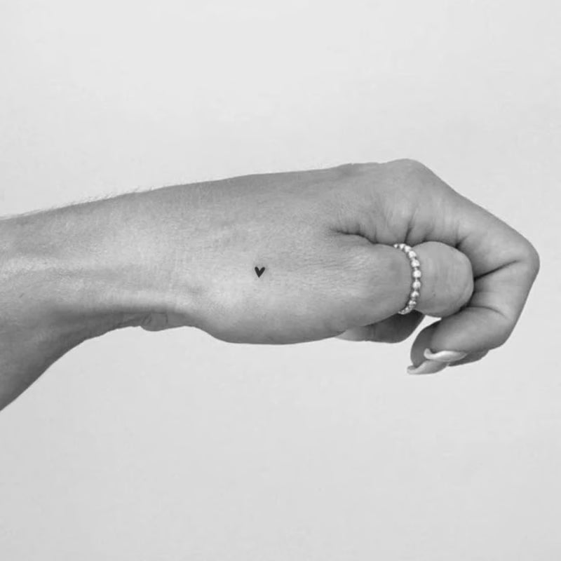 Tiny Heart Freckle Tattoo
