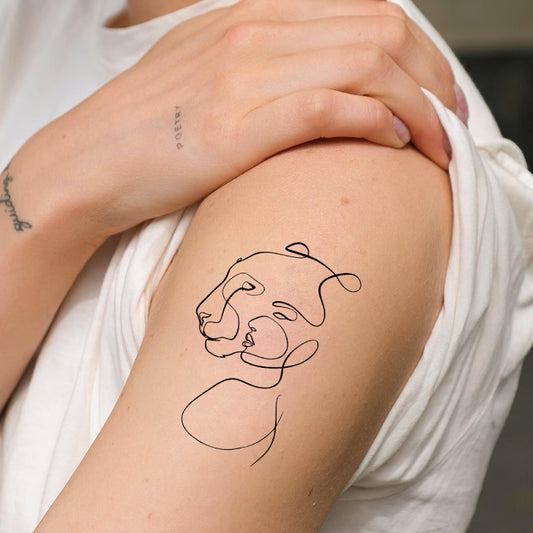 Lion Face And Human Silhouette Tattoo